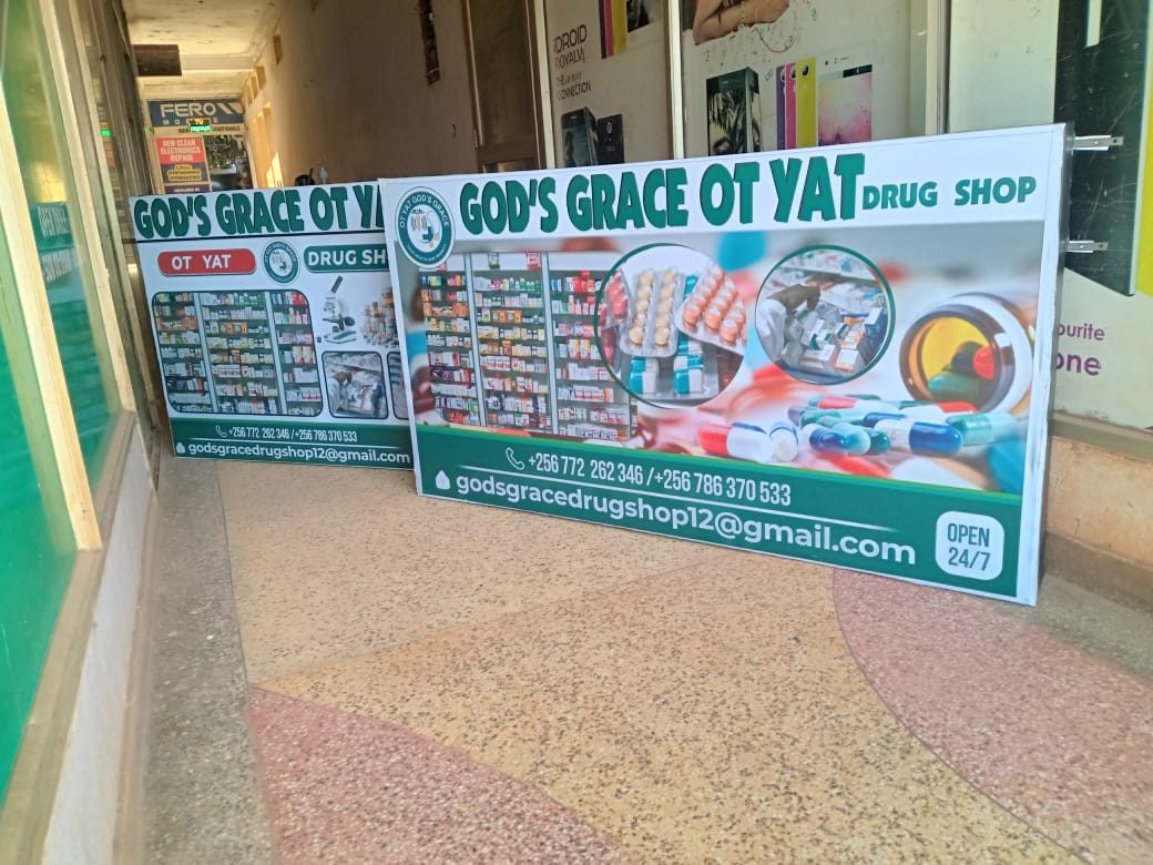 A large printed shop signboard produced for a client